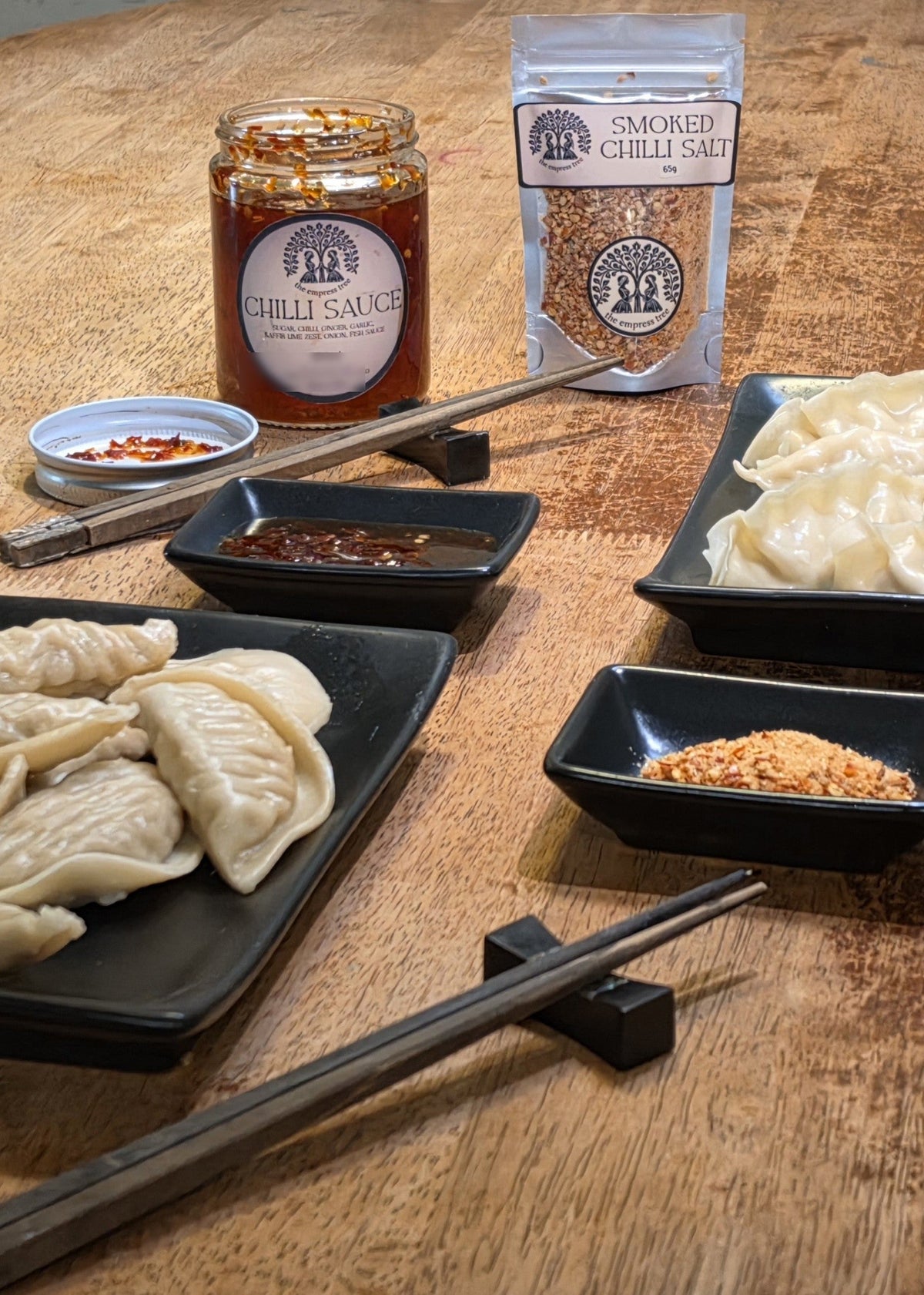 Dumplings with the empress tree hot chilli sauce and smoked chilli salt